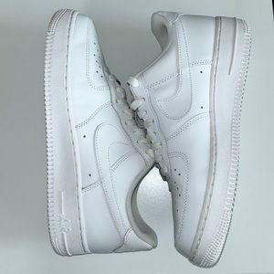 White Nike Air Force 1 shoes